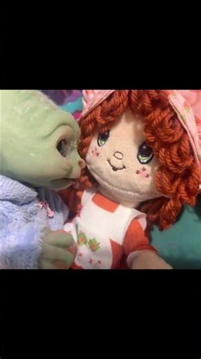 Baby Yoda gives Strawberry Shortcake a hug