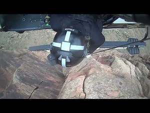Hoist rescue of stranded; injured BASE jumper outside of Moab, Utah