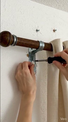 How to fix a loose curtain rod bracket?
