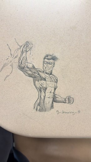 Drawing Invincible on my Desk in Class