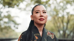 Aikido, kimono and vision with woman in nature for sword exercise, practice or training. Bamboo, culture and thinking with confident Japanese Samurai in forest for kendo, martial arts or tradition