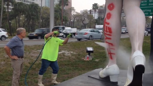 Statue based on famous WWII 'kissing sailor' photo spray-painted with 'MeToo'