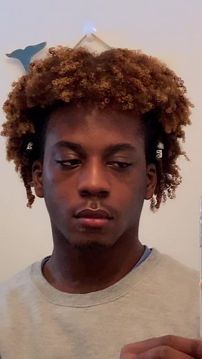 Introducing the Afro-Mullet Hairstyle for Black Men