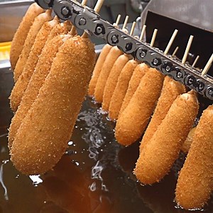 209K views · 3.8K reactions | Mass production! Crispy Korean Hot Dogs Making Process - Korean food factory. | My Pub Food | Facebook