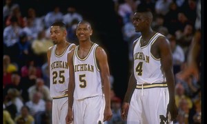 WATCH: Juwan Howard, Chris Webber Reunite To Celebrate Michigan's Upset Win