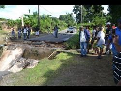 Dumbarton, St Ann residents could wait until 2017 for road repairs