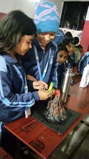 "volcano model made by Anushka or lovely, class 2".