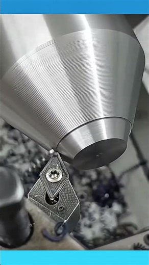 Sharpening a metal rod to a precise, pointed tip with smooth, even edges.