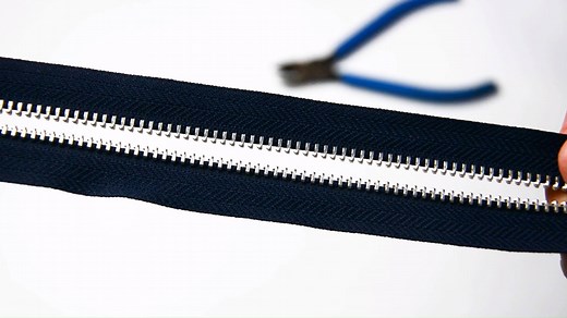 See the video below. You may wonder how to change the length of zipper. First, you need have plier to pull off the teeth at the position you want to stop the length.Then, using a pair of alloyed top stop to fill the gap of pulled teeth. Here also need the help of plier. The top stop will bite the tape to avoid the slider slide off. So the finished metal zipper is completed with new length! | Fujian SBS Zipper Science & Technology Co.Ltd.