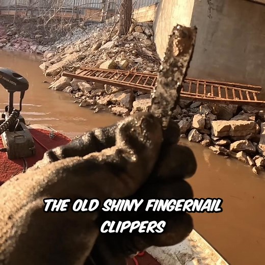 The magnet pulls up something massive from the riverbed. It's an old frame piece, bigger than anything we found before. What could it have been used for? #magnetfishing #riverfinds #treasurehunt #urbanexploration | The Fisher