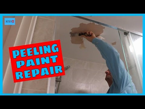 Repairing peeling paint in a bathroom.
