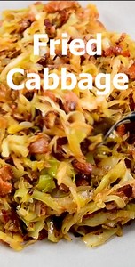 There are only 3 ingredients in my fried cabbage recipe and it’s simply seasoned with salt and pepper. It’s an excellent side dish that’s done in about 30 minutes. The flavor is just perfect from caramelization of vegetables and crispy bacon! #easyrecipesathome #willcookforsmiles #sidedishes #sidedish #FriedCabbage #friedcabbagewithbacon #baconlove #baconbaconbacon https://www.willcookforsmiles.com/fried-cabbage/ | Will Cook For Smiles