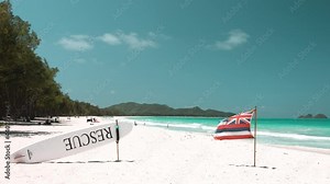 Flag of Hawaii on Waimanalo Bay State Recreation Park, Oahu, Hawaii. The longest stretch of sandy shoreline on Oahu