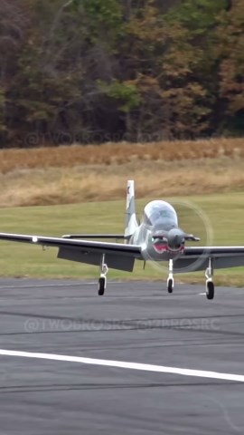 Super Tucano performing a slip touch and go maneuver