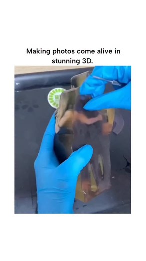 GlobalReelsX on Instagram: "The video demonstrates a resin casting process using photopolymer liquid to create hyper-detailed 3D figurines from 2D photos, layering green resin into molds for lifelike depth and texture. This technique often starts with AI-generated 3D models from single images, followed by stereolithography (SLA) printing, allowing custom portraits like the hugging couple and group scenes shown. Such artistry has surged in popularity via social platforms, with services like JLC3D