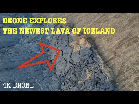 Incoming lava stopped by the mountain and pushing uphill! 4K Drone of newest lavafield in #Iceland
