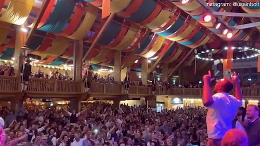 Legendary sprinter shows off his signature Lightning Bolt move