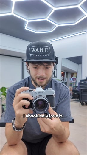 Adam Isbill on Instagram: "Certified hipster ✔️ Bringing my love of 35mm film photography into the shop! 📸 #barbershop #filmphotography #35mm #barberlife #barber"