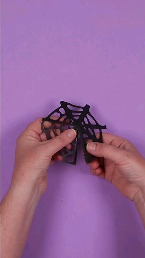 Crafting a wonderful webbed spider umbrella! 🕷️🕸️