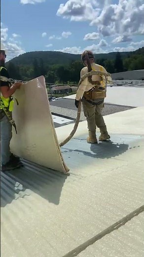 Applying spray foam for a new SPF Roofing System!