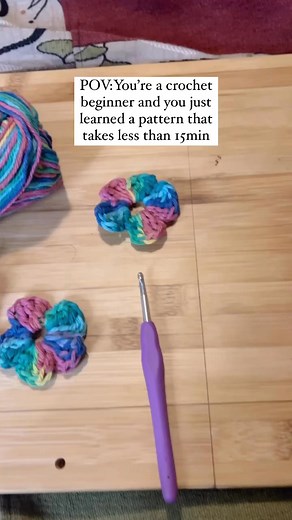 Let me know if you want a video tutorial. For those who can read crochet here you go👇🏽After initial hoop -Chain 6 -Slip stitch into first chain Petal -Single crochet -Chain 2 -Treble 3 -Chain 2 -Single crochet -slide stitches down(Repeat those steps 4 times. You should have a total of 5 petals)End After your final single crochet to a slip stitch into the first single crochet you made with the first petal. Tie knot. Size of flower will vary depending on needle and yarn you use. Have fun! #croch