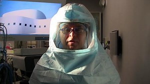 This Doctor Wears a Space Suite to Create a Super Sterile Environment During Surgery