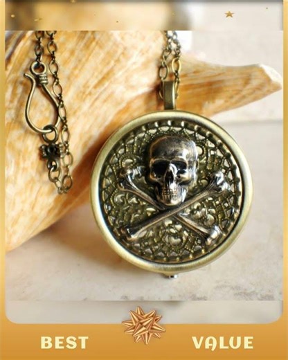 Skull and Crossbones music box locket.