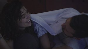 Playful couple having fun between the sheets - Free Stock Video