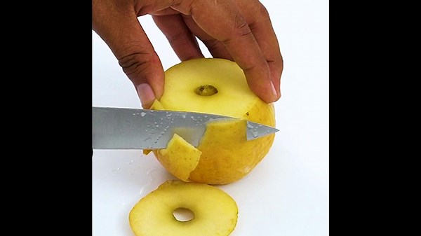 Satisfying Peeling A Yellow Apple