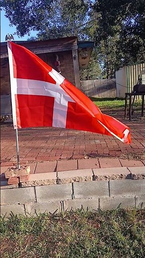 Big flag of Denmark waving in the wind