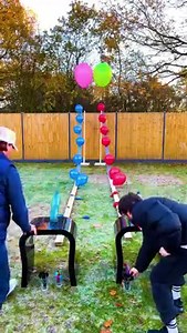 2.3M views · 10K reactions | Bottle flip balloon popping game | Woody & Kleiny | Facebook