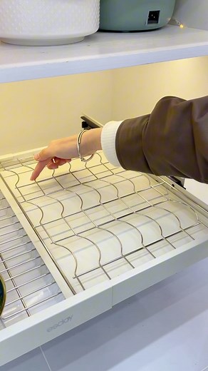 627K views · 2.8K reactions | ️ Kitchen retractable dish storage rack! The cabinet retractable dish rack is not picky about size and can store dishes in one. Made of stainless steel, you can store it without worrying about rusting.Thickened track, smooth pulling and durable #dishrack #dishdrainrack #kitchengoodies | Tiffany Design Studio | Facebook