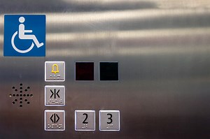 Image of disabled lift button. Stainless steel elevator panel push...