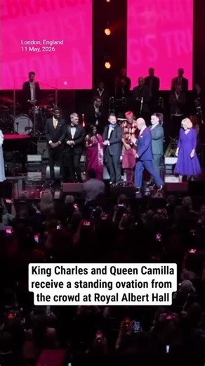 King Charles and Queen Camilla receive a standing ovation from the crowd at Royal Albert Hall