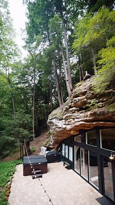 Who would you getaway with in this cave stay in Ohio?😍 🏷️ - - - #hockinghills #hockinghillsohio #ohio #hockinghillsstatepark #ohiogetaways #cabinaddicted #cabin #cabininthewoods #cave #cavestay | Dunlap Hollow