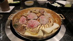 grill pork on brass pan,hot pot or shabu-shabu.