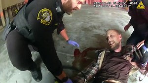 'Stop resisting' | Body cam captures struggle between officers, man accused of attacking fire lieutenant
