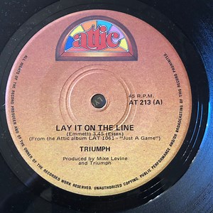 Triumph - Lay It On The Line