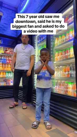 Kids and Adults Dancing Together in a Store