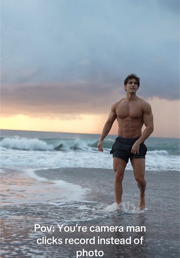 Muscular Man Running on Beach: Captured Moments