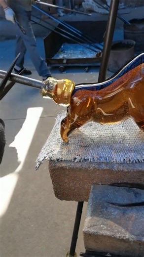 Art Living Union on Instagram: "Hot molten glass art is a mesmerizing craft where artists shape glowing liquid glass at 2,100°F (1,150°C) into stunning creations 🔥🫧. Working fast with tools like blowpipes and shears, they transform the molten glow into elegant vases and vibrant glassware ✨🫙. What do you think now? Art credit: dht2018 (Döuyin) Tag someone who needs to see!👇"