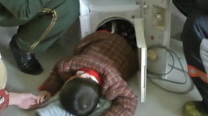 Boy in washing machine puts firefighters in a spin