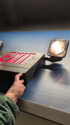 Testing a JeWoo generic incandescent exit sign combo in black housing