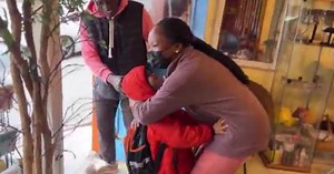 A circle of community and caring at Le Balafon African braiding salon