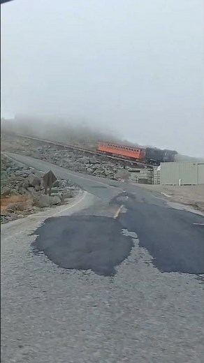 The Cog! Cog railroad train ascending Mt. Washington, New Hampshire