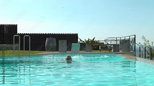 Man coming out of the water pool