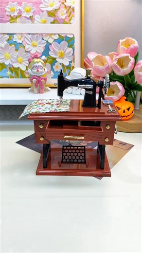 Let the gentle melody of this vintage sewing machine music box stitch together your most cherished memories. 🧵✨ | Gatheringe