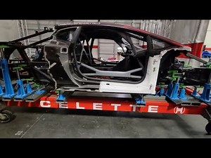 Lamborghini race car frame repair on Celette bench with dedicated fixtures