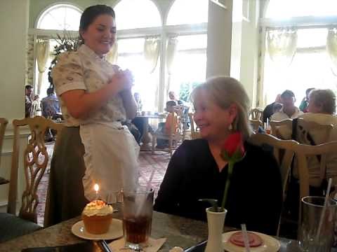 lots of people sing happy birthday to grandma