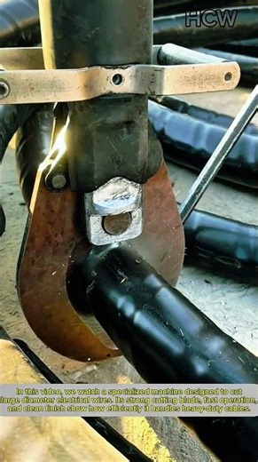 Powerful Machine Cutting Large-Diameter Electrical Wire.